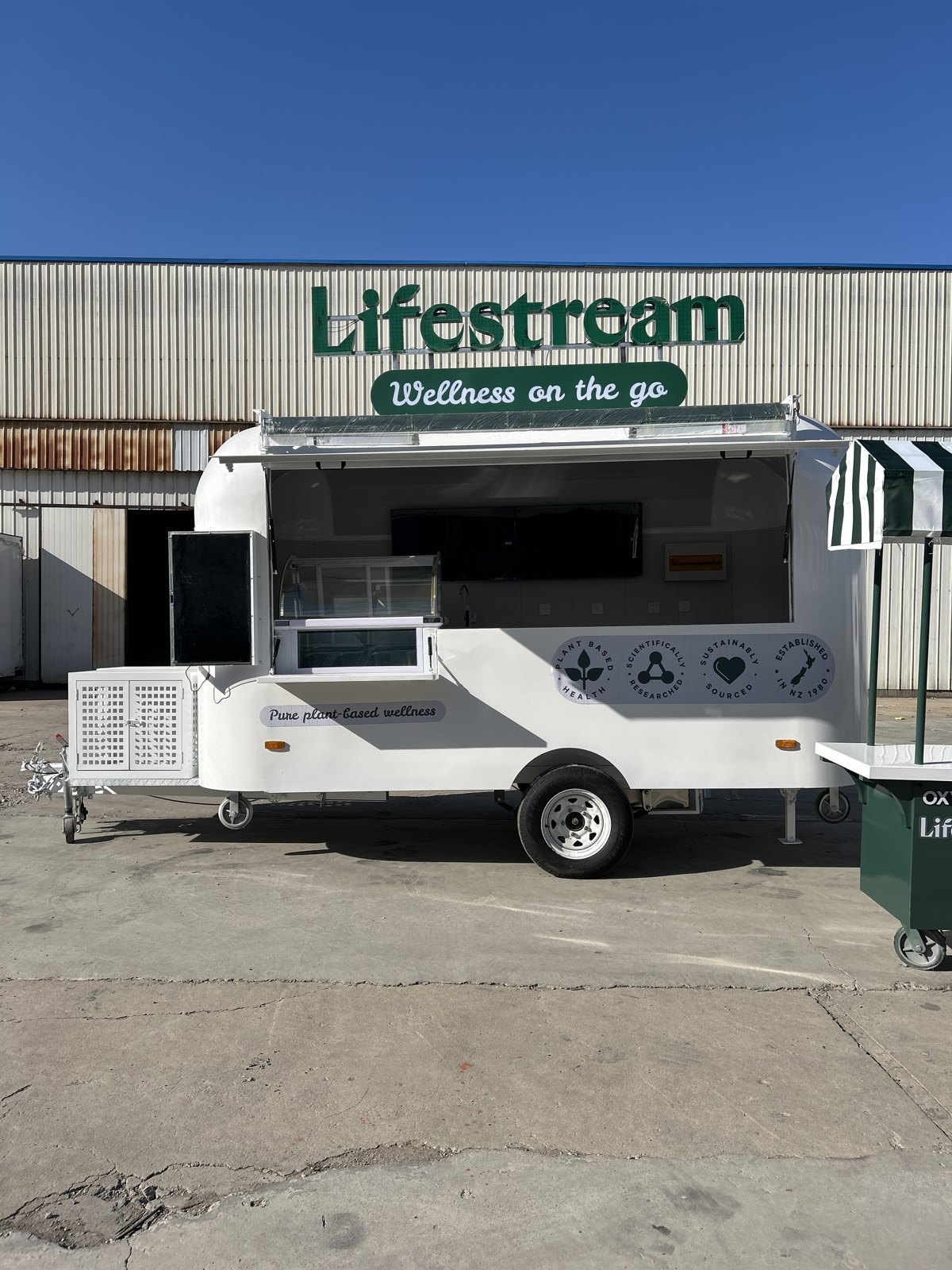 Lifestream serving side and rooftop sign