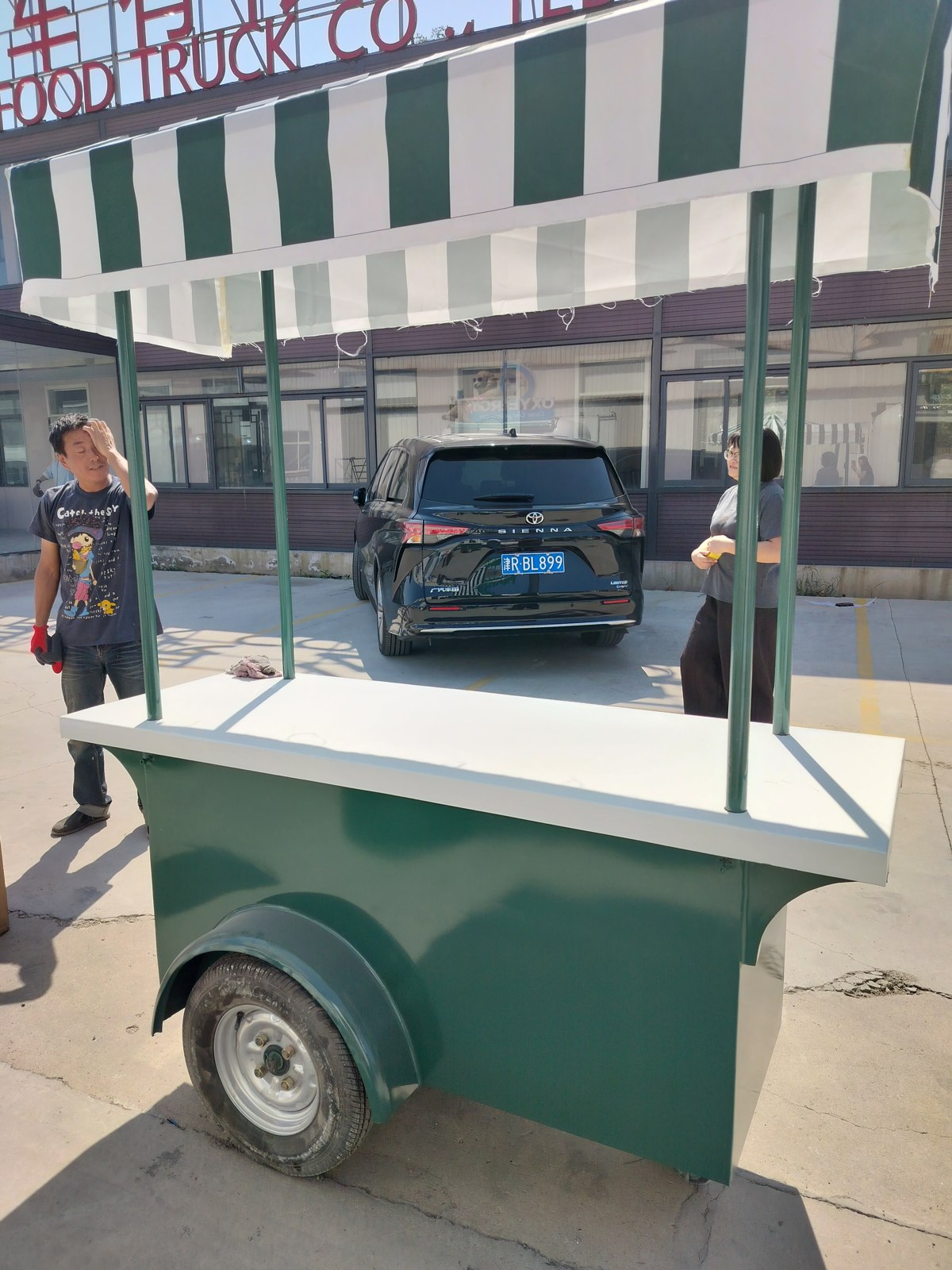 Matching sampling cart with its striped canopy