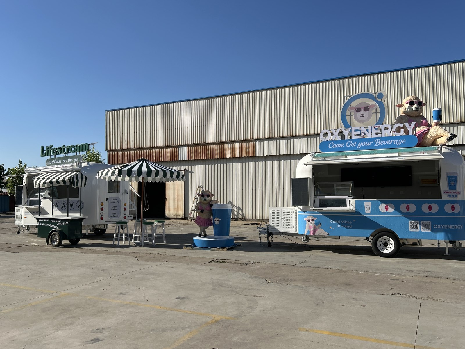 Both trailers displayed alongside the outdoor seating area