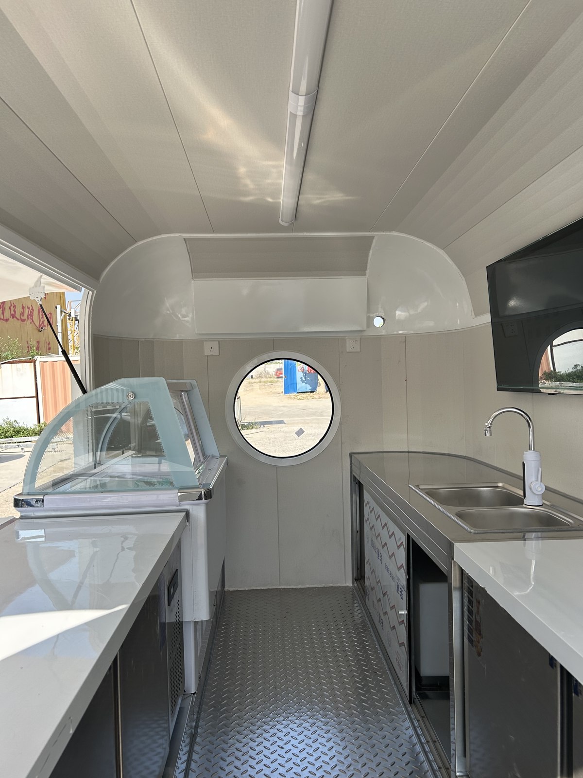 Finished interior showing the display and preparation areas on opposite sides