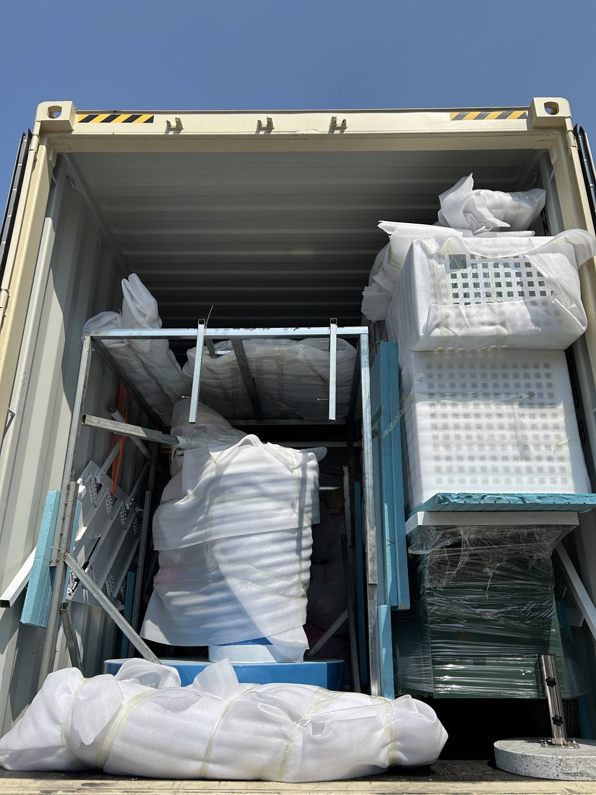 Trailers and accessories arranged inside the container