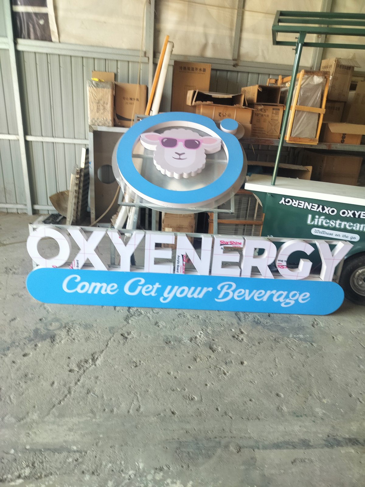 Close-up of the OXYENERGY sign