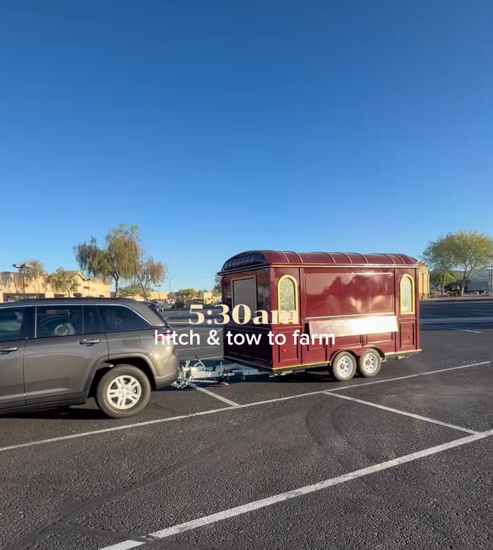 Customer towing the delivered food trailer to the business location before sunrise